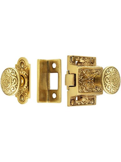 Decorative Cast Brass Screen Door Latch Set In Polished Brass.